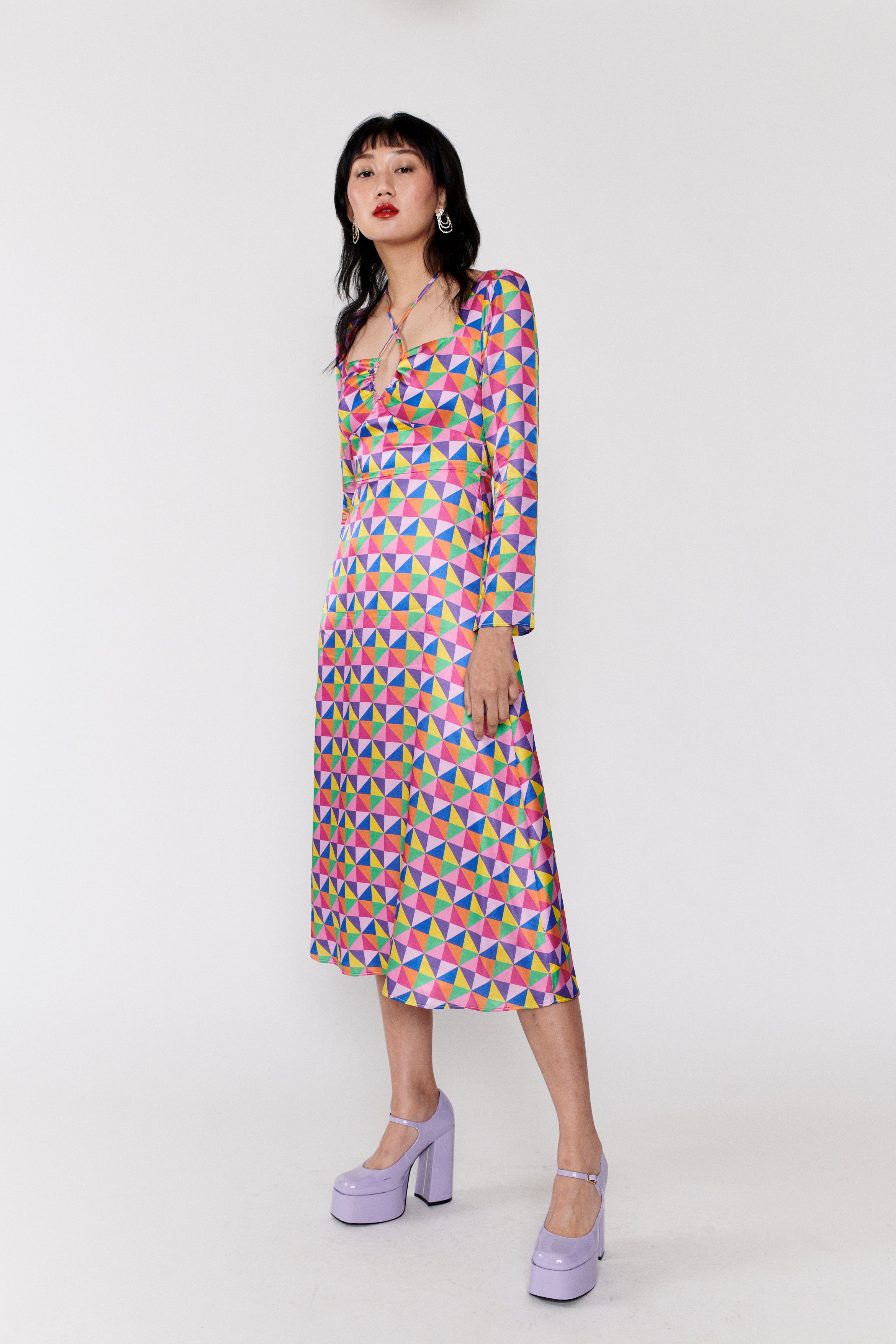 elliot midi dress Level up your next night out with the Elliott Midi Dress. Seen on the amazing @christinebalaguer_