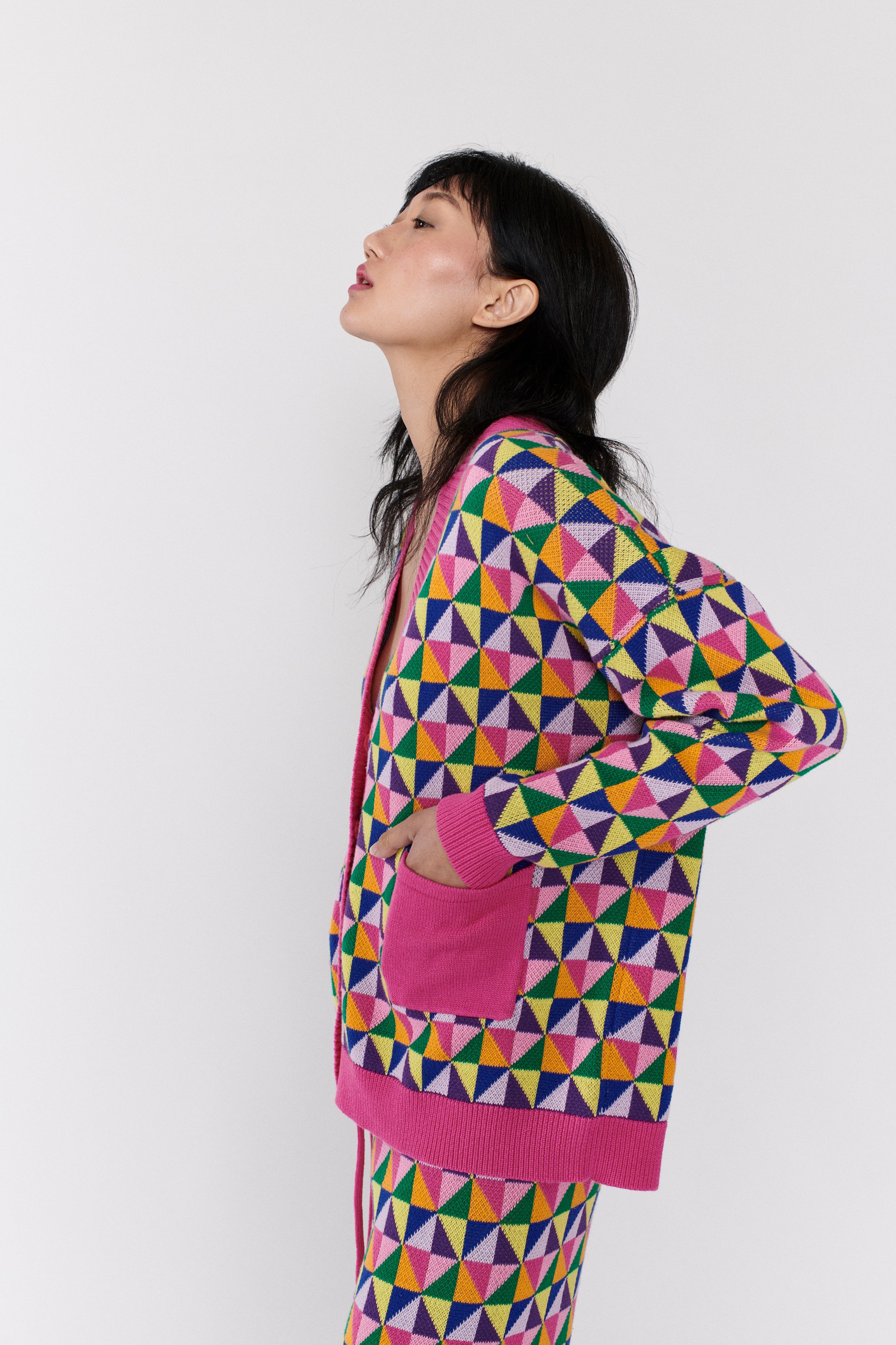 Magda cardigan in pink and multicolour origami pattern with front pockets