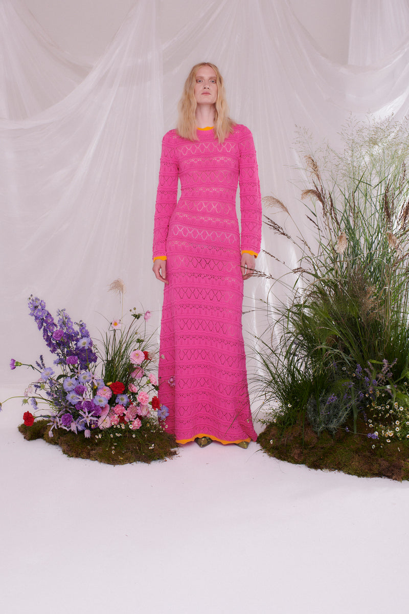 Pointelle knitted maxi dress in pink with orange scallop edges from Olivia Rubin